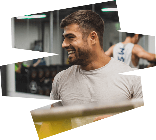 Person smiling in a gym